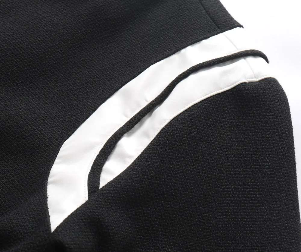P480 Saint Laurent Paris slp classic leather patchwork black and white baseball collar jacket. Original version 1:1 to develop the highest version on the Internet. It took 2 months to customize pure wool fabric and jacquard ribbing (ordinary machines cannot achieve this jacquard effect). The version is super handsome. The patchwork position is very particular about parking technology. Whether the whole dress looks good or not depends on this position. Same style for men and women. Color: black and white spelling/white/black. Size: 46 48 50 52